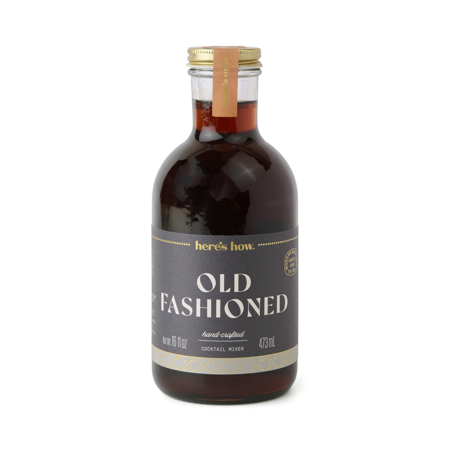 A 473 mL bottle of Old Fashioned cocktail mixer with a black and gold label, filled with a rich cocktail blend.