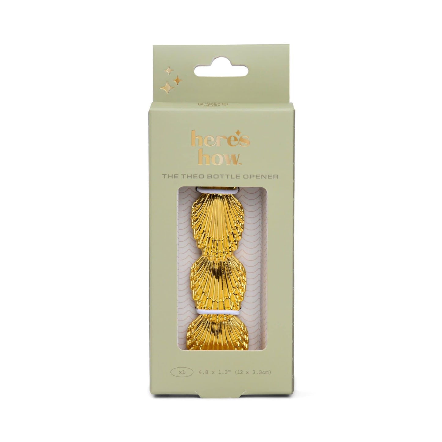 A box labeled “The Theo Shell Bottle Opener” showcases a gold bottle opener shaped like three stacked shells, visible through a window on its light green packaging—perfect for beach lovers or cocktail enthusiasts.