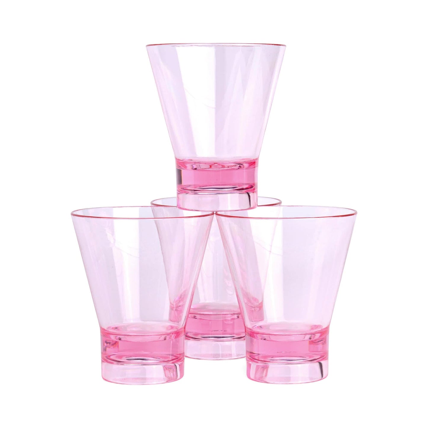 Four transparent The Gilda Tumbler glasses with pink bases are stacked in a pyramid against a white background, ideal for serving cocktails at your next beach gathering.