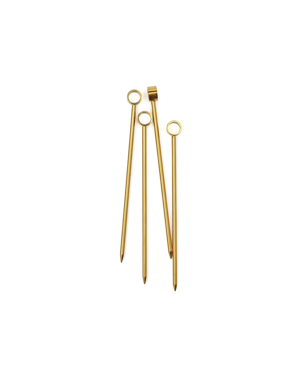 Four of The Owen gold-plated stainless steel cocktail picks, each featuring a circular handle, are displayed on a white background.