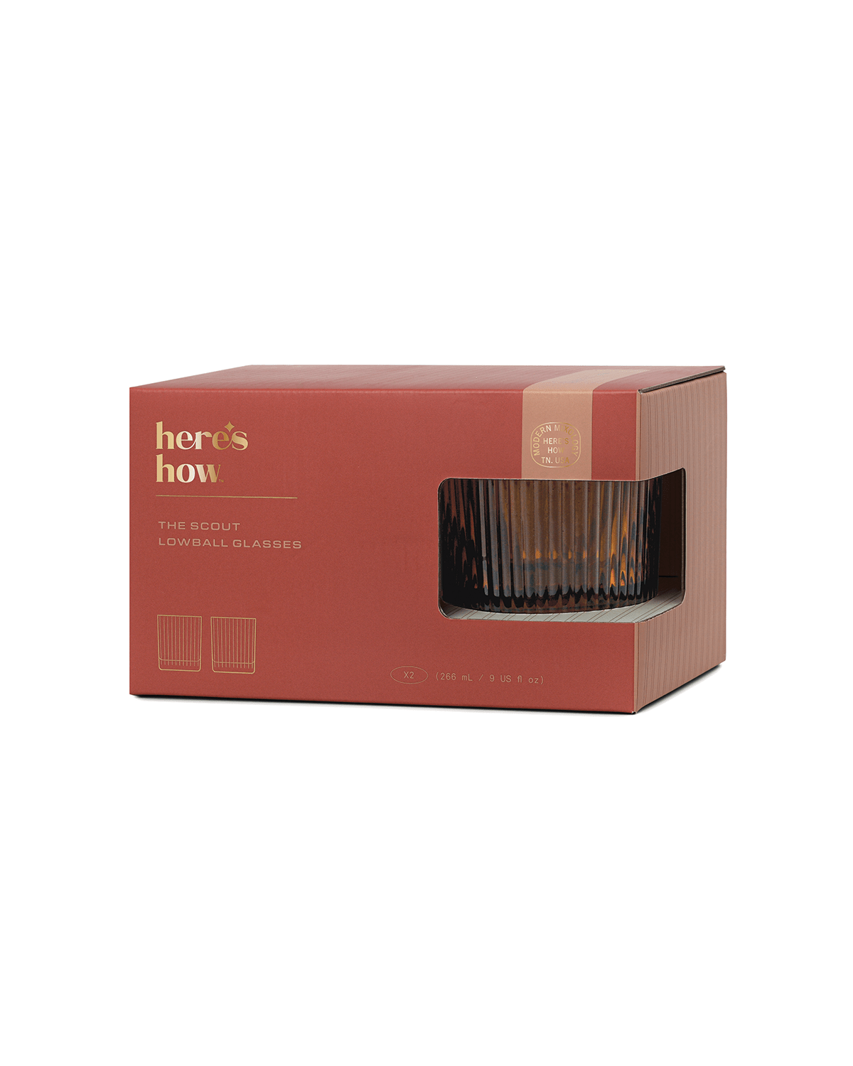 A red and brown box labeled The Scout features a clear window displaying ribbed soda lime glassware inside.