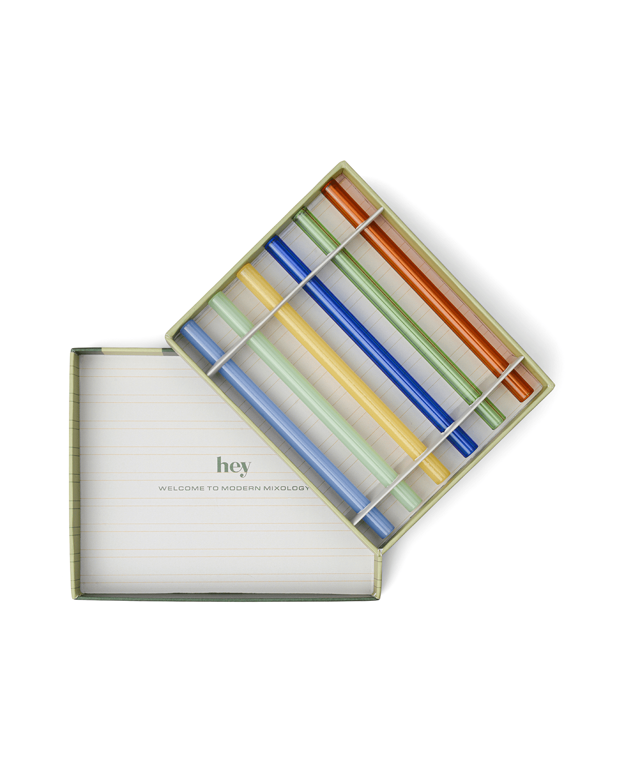 The Whistler: An open box of six colored glass straws in separate slots, with a partially removed lid revealing “hey WELCOME TO MODERN MIXOLOGY”—the perfect vibrant addition to any home bar.