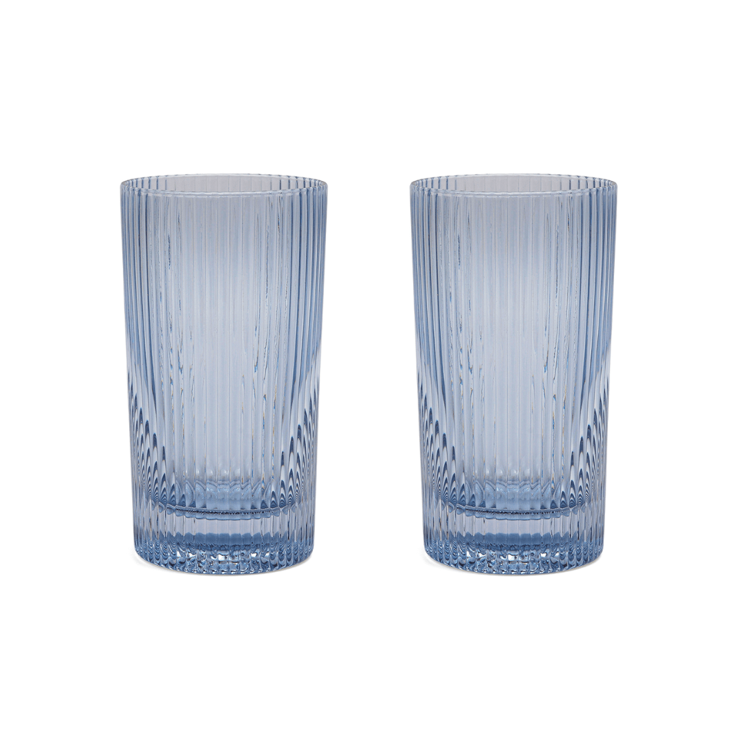 Two “The Stella” clear blue fluted glasses, crafted from soda lime glass, are displayed side by side on a white background.