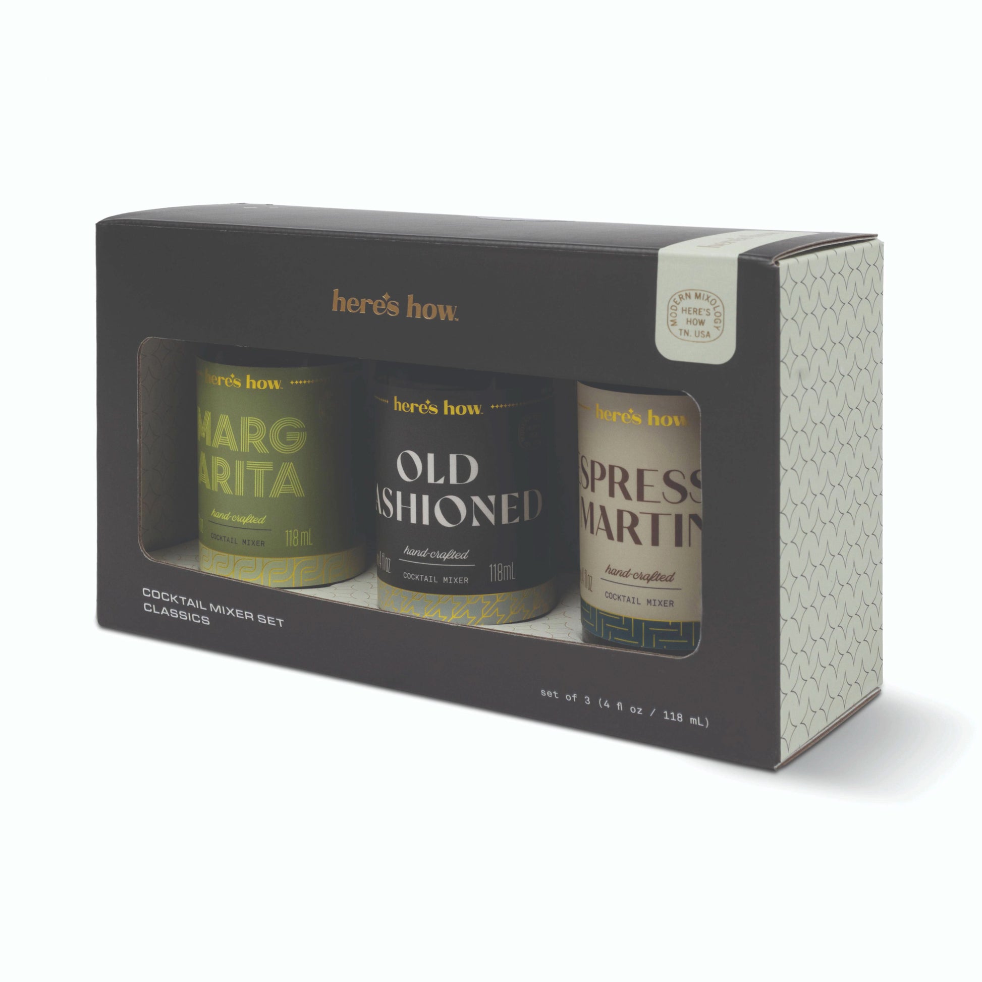 Here's how Cocktail Mixer Set Classics gift box containing three canisters: Margarita, Old Fashioned, and Espresso Martini, shown on a white background.