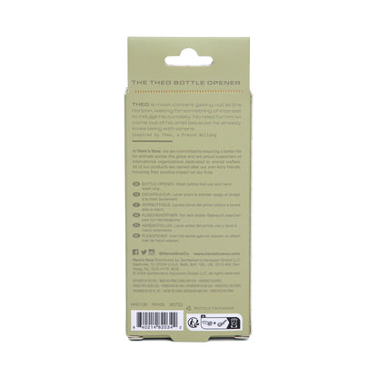 Back view of packaging for The Theo Shell Bottle Opener, ideal for beach lovers and cocktail fans, with descriptive text, usage instructions, and recycling info on a light green background.