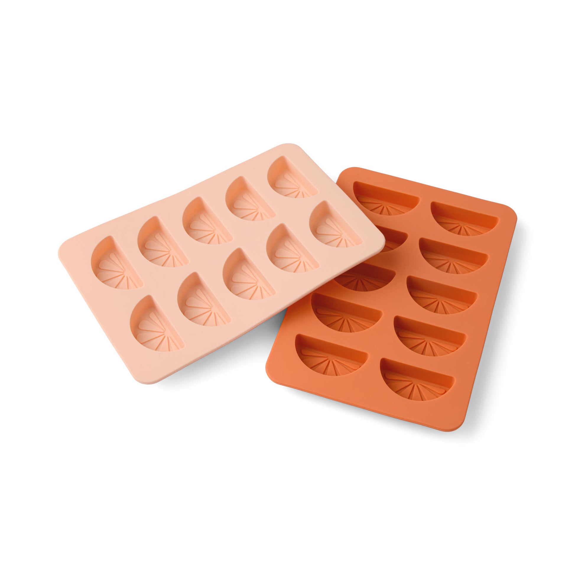 The Dotty Citrus Wedge Ice Trays come in peach and orange, each with eight citrus wedge-shaped cavities, adding a playful flair to your ice cubes. Shown on a white background.