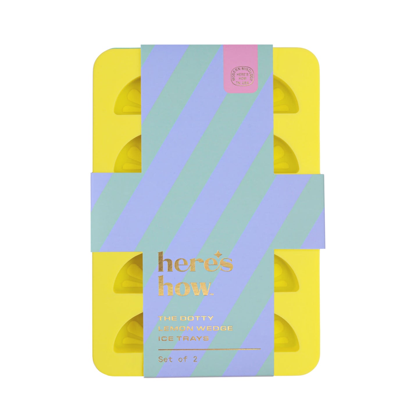 A set of two yellow ice trays shaped for citrus wedges, perfect for fun wedge-shaped ice cubes, packaged with a pastel striped band labeled heres how: The Dotty Citrus Wedge Ice Trays.
