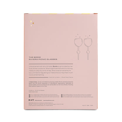 Back of a box for The Bodie Riviera Glass, with a product and company description alongside simple line drawings of two glasses—perfect for picnics and outdoor enjoyment.