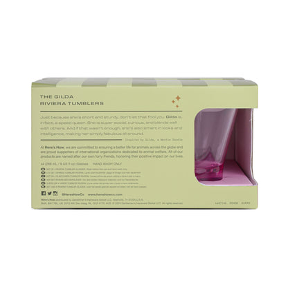 Back of The Gilda Tumbler box with product description and care instructions. A pink tumbler, ideal for beach cocktails or pairing with your favorite Gilda glasses, is partially visible through a window in the lower right corner.
