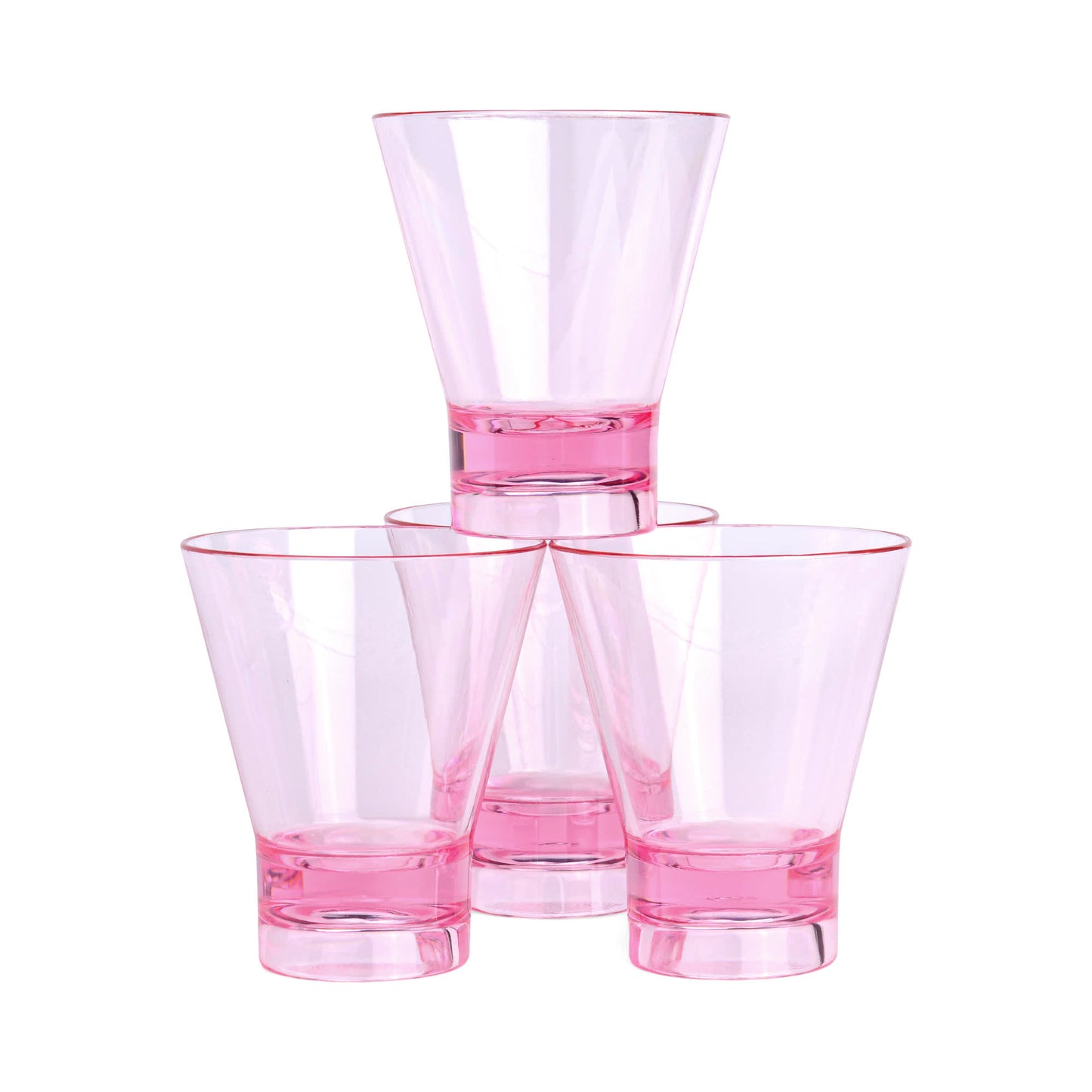 Four transparent The Gilda Tumbler glasses with pink bases are stacked in a pyramid against a white background, ideal for serving cocktails at your next beach gathering.