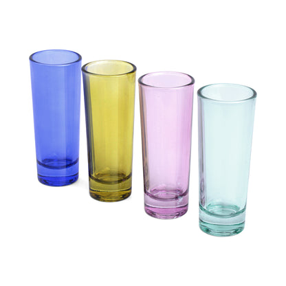 The Gracie Set Of 4 Shot Glasses includes empty blue, yellow, pink, and light green glasses arranged in a row on a white background—perfect for your next party or celebration.