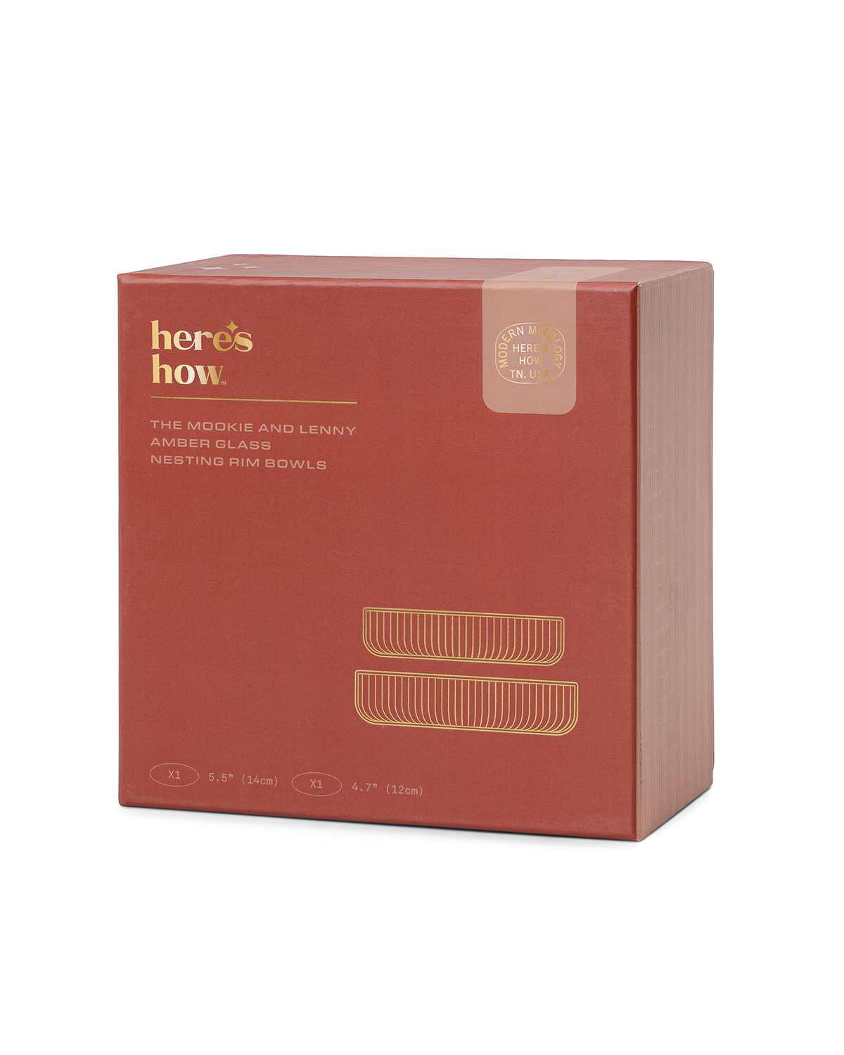 A red Heres How. box contains Mookie + Lenny colored glass nesting rim bowls made from amber soda lime glass, featuring size details and gold foil accents on the packaging—perfect for home bar essentials.